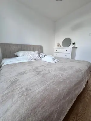 Łóżko lub łóżka w pokoju w obiekcie Forest Apart V