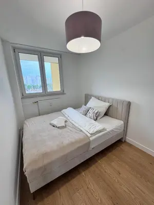 Łóżko lub łóżka w pokoju w obiekcie Forest Apart V