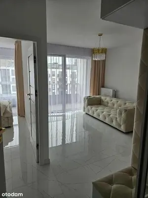 Łóżko lub łóżka w pokoju w obiekcie Luxury building & apartament, near metro, parking