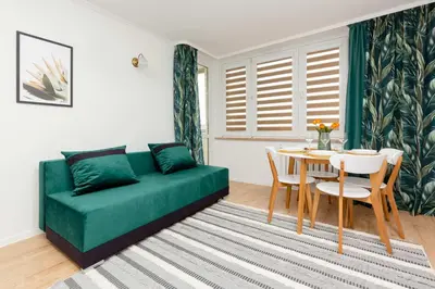 Część wypoczynkowa w obiekcie Spacious Apartment close to PGE Stadium in Warsaw by Noclegi Renters