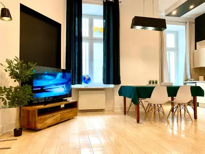 Telewizja i/lub zestaw kina domowego w obiekcie ModernApart