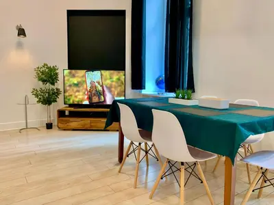 Telewizja i/lub zestaw kina domowego w obiekcie ModernApart