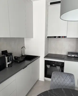 Kuchnia lub aneks kuchenny w obiekcie Towarowa Towers Apartment