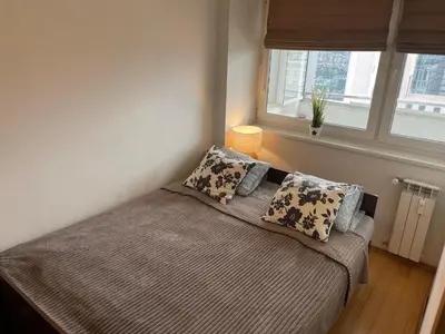 Łóżko lub łóżka w pokoju w obiekcie ComeWa Apartments