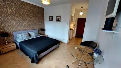 Telewizja i/lub zestaw kina domowego w obiekcie ComeWa Apartments
