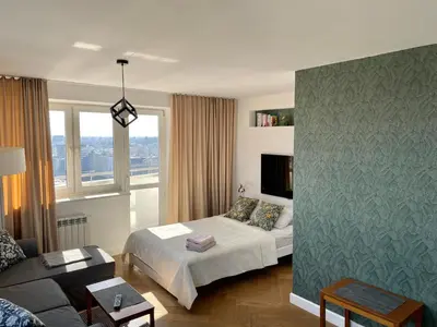 Łóżko lub łóżka w pokoju w obiekcie ComeWa Apartments