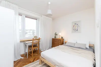 Łóżko lub łóżka w pokoju w obiekcie Piwarskiego by VAYA STAYS