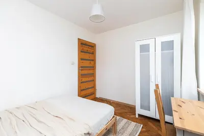Łóżko lub łóżka w pokoju w obiekcie Piwarskiego by VAYA STAYS