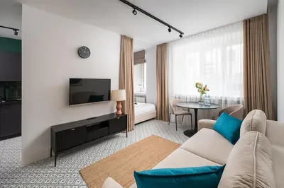 Telewizja i/lub zestaw kina domowego w obiekcie Heart of Downtown Pretty Studio