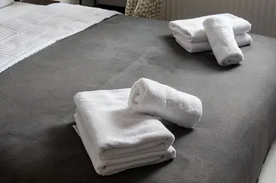 Łóżko lub łóżka w pokoju w obiekcie Bemowo Homely Apartment by BookingHost