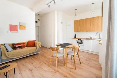 Kuchnia lub aneks kuchenny w obiekcie Dobra Powiśle Superior Apartment by BookingHost