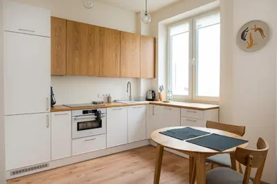 Kuchnia lub aneks kuchenny w obiekcie Dobra Powiśle Superior Apartment by BookingHost