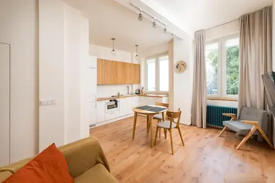 Kuchnia lub aneks kuchenny w obiekcie Dobra Powiśle Superior Apartment by BookingHost