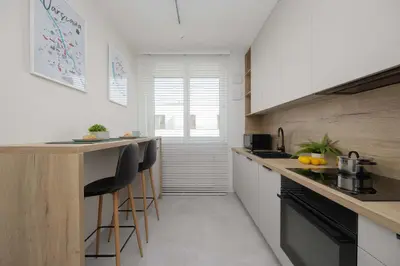 Kuchnia lub aneks kuchenny w obiekcie Cosy Air-Conditioned Apartment with Parking in the Garage by Renters Prestige