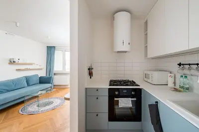 Kuchnia lub aneks kuchenny w obiekcie Solec Powiśle Deluxe Apartment by BookingHost