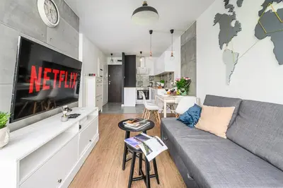 Telewizja i/lub zestaw kina domowego w obiekcie Lumina bright apartments in Warsaw