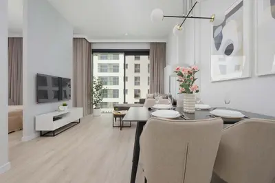 Telewizja i/lub zestaw kina domowego w obiekcie Towarowa Towers Prestigious Apartaments with AC & Parking in Warsaw by Renters Prestige