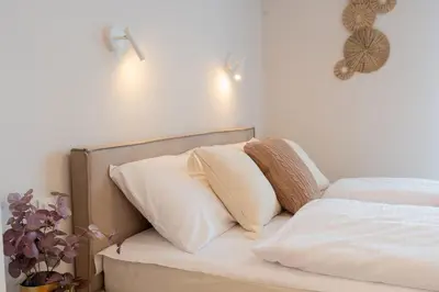 Łóżko lub łóżka w pokoju w obiekcie Rose Studio Ursynow King Bed Terrace