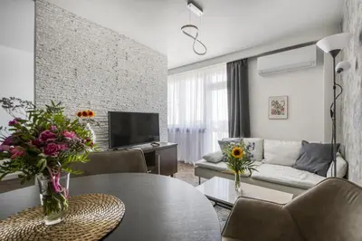 Telewizja i/lub zestaw kina domowego w obiekcie Powiśle Skyview Apartment