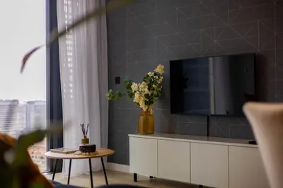 Telewizja i/lub zestaw kina domowego w obiekcie Towarowa Tower Apartment, Free Parking