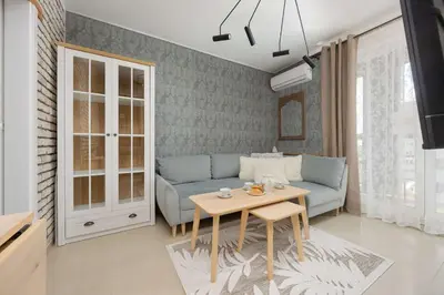 Część wypoczynkowa w obiekcie Spacious Apartment for 4 People with Air Conditioning by Noclegi Renters