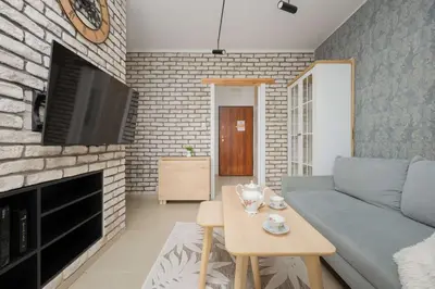 Część wypoczynkowa w obiekcie Spacious Apartment for 4 People with Air Conditioning by Noclegi Renters