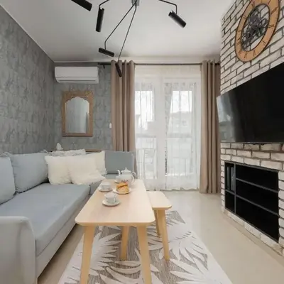 Spacious Apartment for 4 People with Air Conditioning by Noclegi Renters