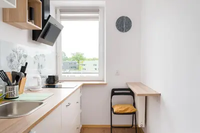 Kuchnia lub aneks kuchenny w obiekcie Embassy District Apartment by Bookinghost