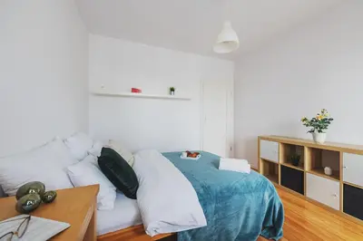 Łóżko lub łóżka w pokoju w obiekcie P&O Apartments Namysłowska 6c