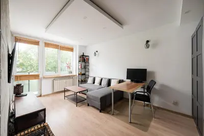 Telewizja i/lub zestaw kina domowego w obiekcie Afrykańska Urban Chic Apartment by BookingHost