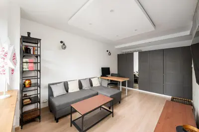 Część wypoczynkowa w obiekcie Afrykańska Urban Chic Apartment by BookingHost