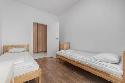 Łóżko lub łóżka w pokoju w obiekcie Przebiśniegów 6 by Homeprime