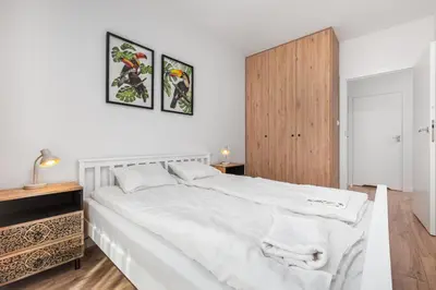 Łóżko lub łóżka w pokoju w obiekcie Domaniewska 24 by Homeprime