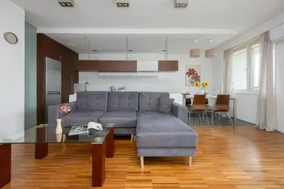Część wypoczynkowa w obiekcie Air-conditioned Apartment near Łazienki Park with Parking by Noclegi Renters