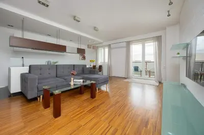 Część wypoczynkowa w obiekcie Air-conditioned Apartment near Łazienki Park with Parking by Noclegi Renters