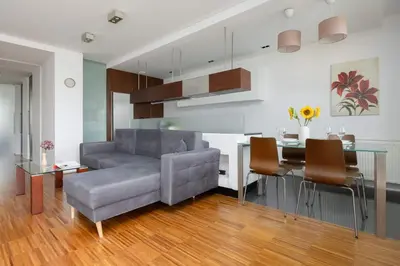 Część wypoczynkowa w obiekcie Air-conditioned Apartment near Łazienki Park with Parking by Noclegi Renters