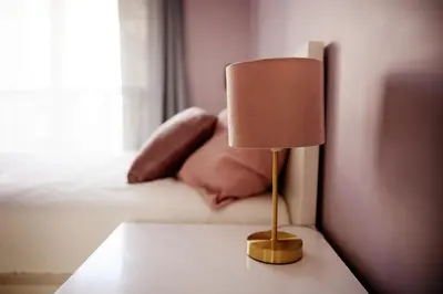 Łóżko lub łóżka w pokoju w obiekcie Lila apartament