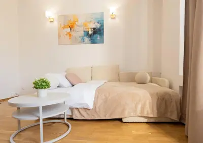 Łóżko lub łóżka w pokoju w obiekcie Comfort & City Aleja Solidarnosci