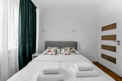 Łóżko lub łóżka w pokoju w obiekcie Nerudy Comfy Living Apartment by Bookinghost