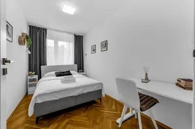 Łóżko lub łóżka w pokoju w obiekcie Nerudy Comfy Living Apartment by Bookinghost