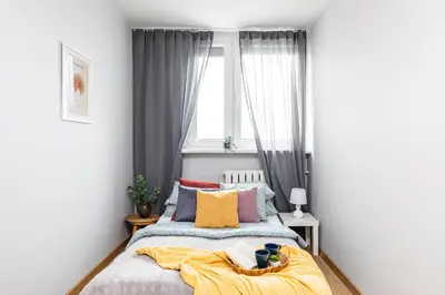 Łóżko lub łóżka w pokoju w obiekcie PRAGA MOOD KONESER by VAYA STAYS