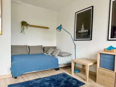 Część wypoczynkowa w obiekcie Cozy Apartment PGE Stadium