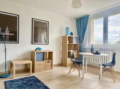 Część wypoczynkowa w obiekcie Cozy Apartment PGE Stadium