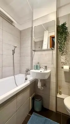 Łazienka w obiekcie Cozy Apartment PGE Stadium