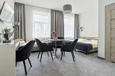 Łóżko lub łóżka w pokoju w obiekcie Nest Guest Rooms by Solarento