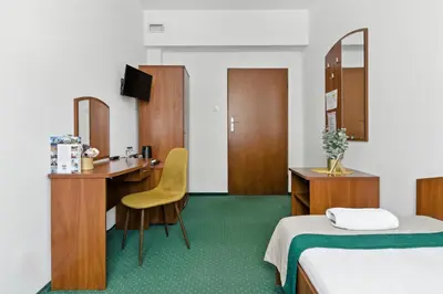 Łóżko lub łóżka w pokoju w obiekcie Nest Guest Rooms by Solarento