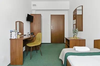 Łóżko lub łóżka w pokoju w obiekcie Nest Guest Rooms by Solarento