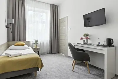 Łóżko lub łóżka w pokoju w obiekcie Nest Guest Rooms by Solarento
