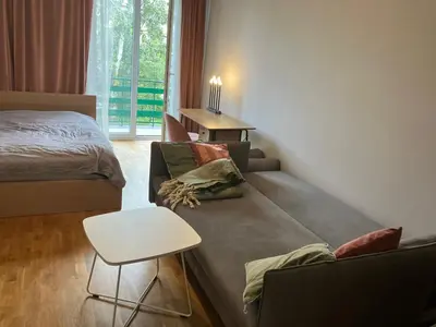Łóżko lub łóżka w pokoju w obiekcie Klimatyczna Kamienica