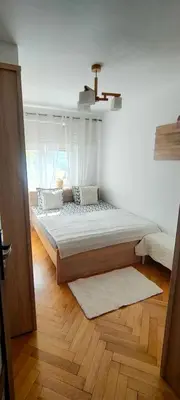 Łóżko lub łóżka w pokoju w obiekcie Ines Apart Twarda